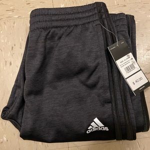 Boys adidas track pants.Never worn, new with tags.